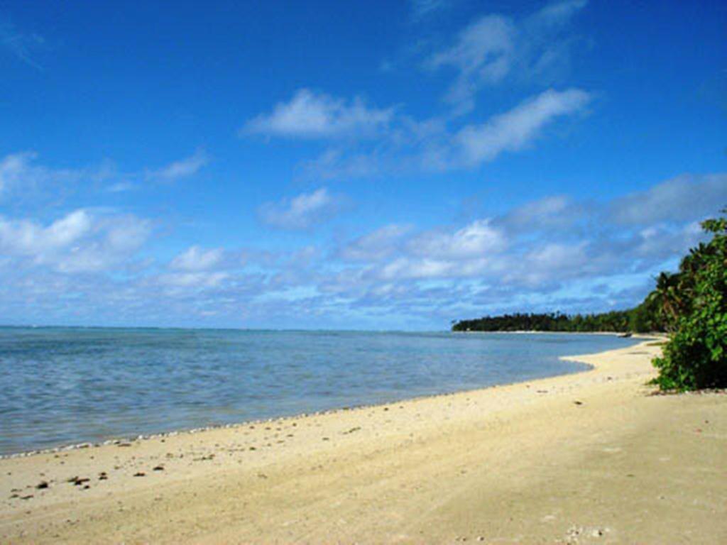 Paparei Beachfront Bungalows, Aitutaki Arutanga Rom bilde